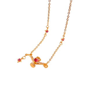 24K gold plated star necklace with red gemstone magic lamp pendant on white background
