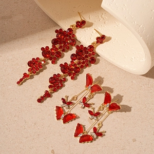 Elegant red crystal flower and butterfly tassel drop earrings in gold finish