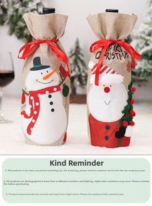 Detail of Christmas wine bottle covers in burlap with Santa and Snowman embroidery