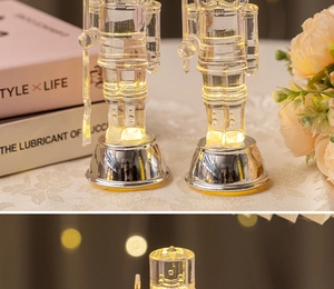 Close-up of LED nutcracker ornament with warm glow and crystal texture finish