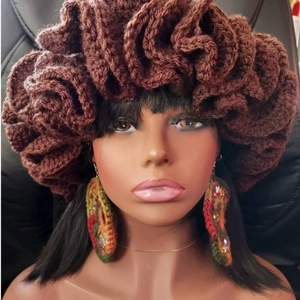 Brown knitted hat with oversized ruffle brim and matching colorful knit earrings