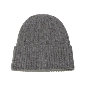 Detailed view of dark grey cable knit pattern and thick cuffed edge on winter beanie