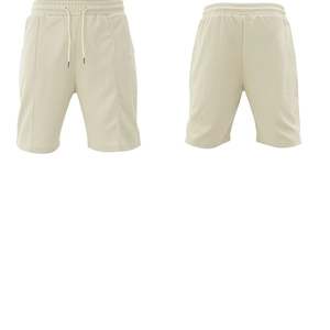 Detail view of beige waffle knit men's casual shorts with drawstring elastic waistband
