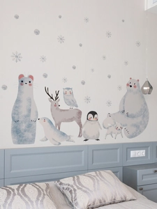 Polar animals wall stickers set featuring polar bear and penguin in a cozy kids bedroom