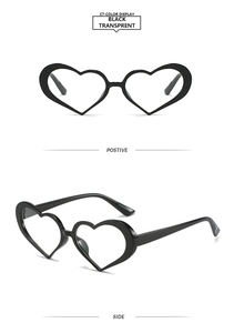 Front and side view of glossy black heart shaped fashion sunglasses on white background