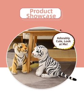 Detailed close-up of realistic tiger plush toys in orange and white striped patterns