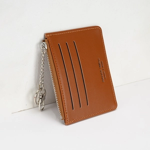 Brown leather card holder with three card slots, zipper closure, and metal keychain