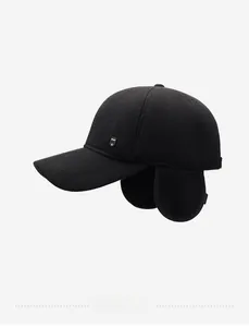 Detail of winter baseball hat with ear flaps featuring thick knit and Sport tag