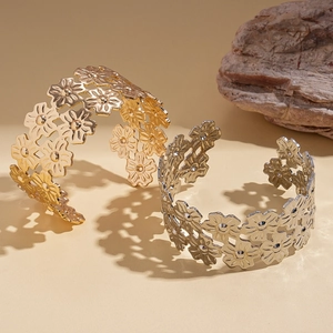 Polished double-layer open flower cuff bracelets in gold and silver finish on stones