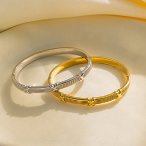 Minimalist gold and silver titanium steel bangles with X-shaped cross and textured patterns