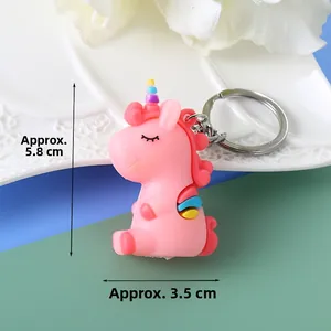 Pink cartoon unicorn keychain detail with size measurements 5.8cm height and 3.5cm width