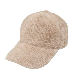 Detailed texture of light brown plush baseball cap with soft faux fur finish