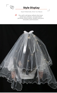Detail of multi-layer white bridal veil with LED lights and white pearl edge decorations