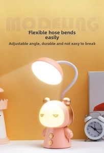 Detail of pink cartoon bear lamp with flexible white neck for multi-angle light adjustment