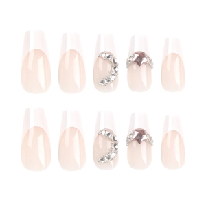 Nude French coffin press-on nails with silver glitter rhinestones and moon star designs