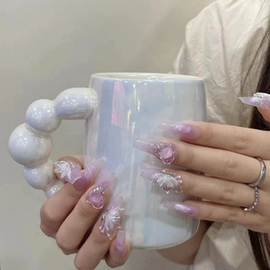 Ongles ballerine longs faits main avec dégradé lavande, nœuds 3D et cristaux
