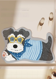 Detail of absorbent bathroom mat with cute Schnauzer dog design and non-slip texture
