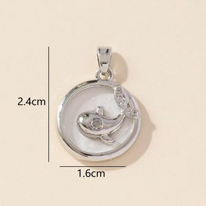 Detailed close-up of a silver whale pendant with zircons, measuring 1.6cm by 2.4cm