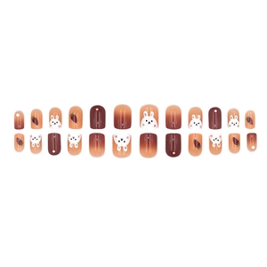 Short press-on nails with cute rabbit and carrot designs in brown and orange gradient