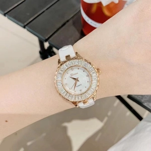Women's white ceramic watch with diamond-encrusted bezel and mother-of-pearl dial