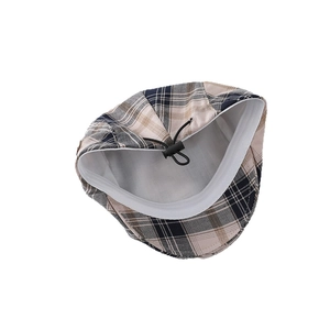 Retro plaid newsboy cap for kids featuring adjustable inner drawstring and soft lining