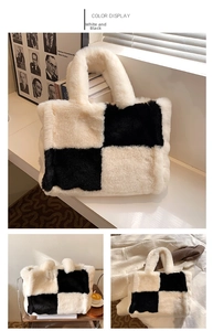 Detail of the black and white checkerboard plush tote bag with a soft faux fur texture