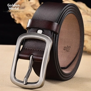 Macro shot of a dark brown leather belt with a matte metal buckle and size engraving