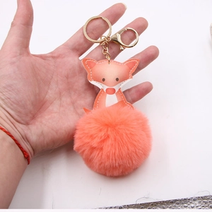 Süßer orangefarbener Fuchs-Schlüsselanhänger aus Leder mit flauschigem Pompon