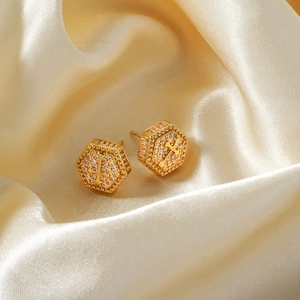 Luxury gold hexagon stud earrings featuring a cross motif and sparkling pavé crystals