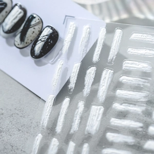 5D embossed nail stickers with white relief brushstroke texture and abstract ink patterns