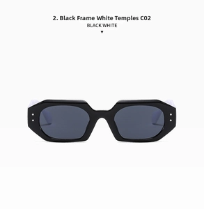 Detail view of bold geometric black sunglasses with contrasting white temples