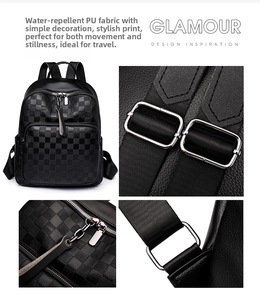 Detail view of checkered backpack with adjustable straps and silver metal buckles