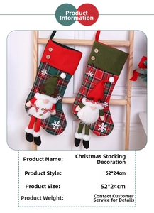 Close-up of a 52x24cm red plaid Christmas stocking with a 3D gnome doll ornament