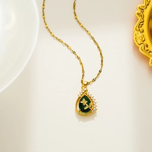 Water drop emerald pendant necklace in titanium steel with zircon micro-paving on gold chain