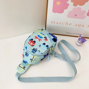 Detail view of children's light blue waist bag with cartoon construction vehicle patterns