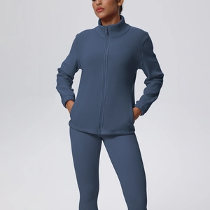 Set yoga da donna grigio-blu in pile con giacca a zip e leggings a vita alta
