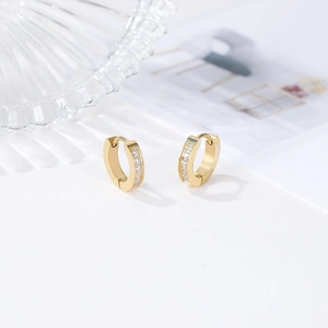 Gold huggie earrings with white zircon channel setting in stainless steel minimalist style