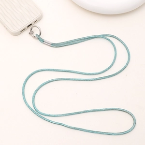 Detail of luxury cyan rhinestone phone lanyard with silver metal circular clasp