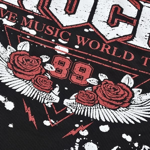 Close-up of distressed vintage Love Music print on textured knit long sleeve dress