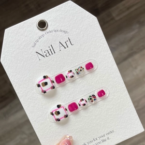 Magenta leopard print press-on toenails with glitter and geometric nail art design
