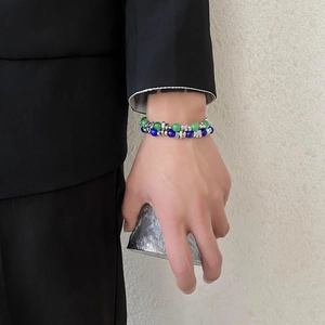Minimalist cat eye bead bracelet with silver spacers and polished blue green stones