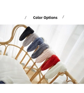 Close-up of soft knit floor socks in various colors with cable knit texture details