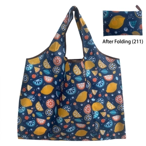 Navy blue foldable shopping bag with fruit patterns and compact folded view display