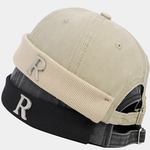 Vintage cotton Miki hats in khaki and black with metallic R logo and adjustable straps
