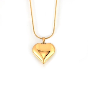Polished 18k gold heart pendant necklace with snake chain on white background