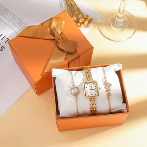 Women's gold quartz watch with love bracelet set in elegant gift packaging