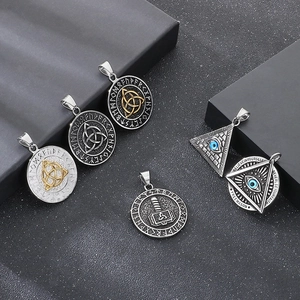 Detailed display of Viking Celtic knots, Mjolnir, and All-seeing Eye steel pendants