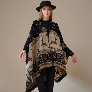 Black knitted poncho with khaki deer and snowflake patterns for a winter style