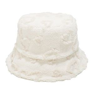 Detailed macro view of white faux shearling bucket hat with 3D floral texture pattern