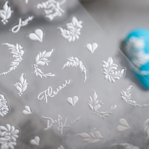 3D embossed floral nail art stickers with white flowers and elegant heart patterns